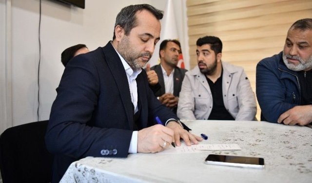 Babacan, 13 mahalle muhtarının taleplerini dinledi